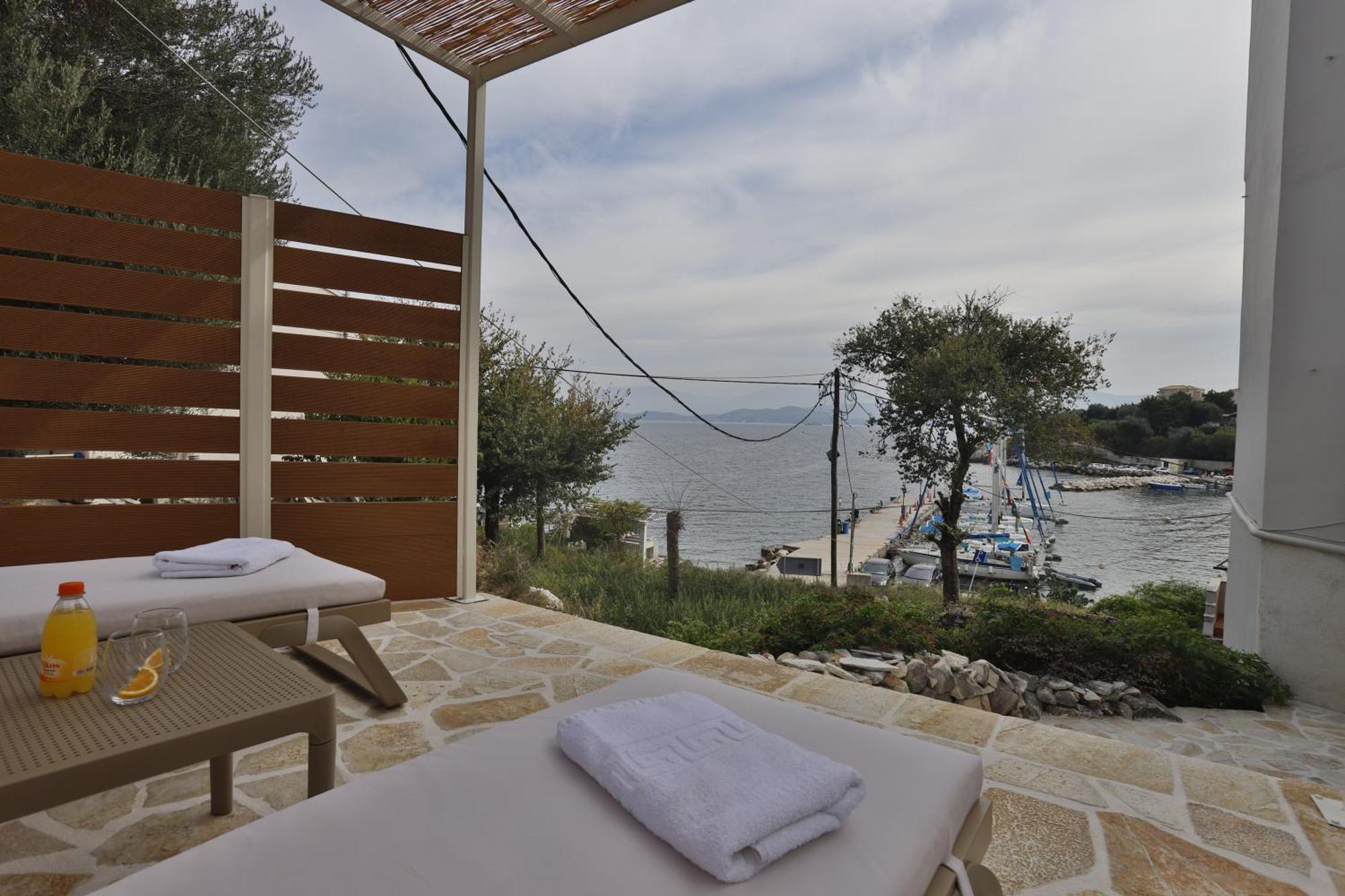 Kassiopi Seafront Elegant Apartments Esterno foto
